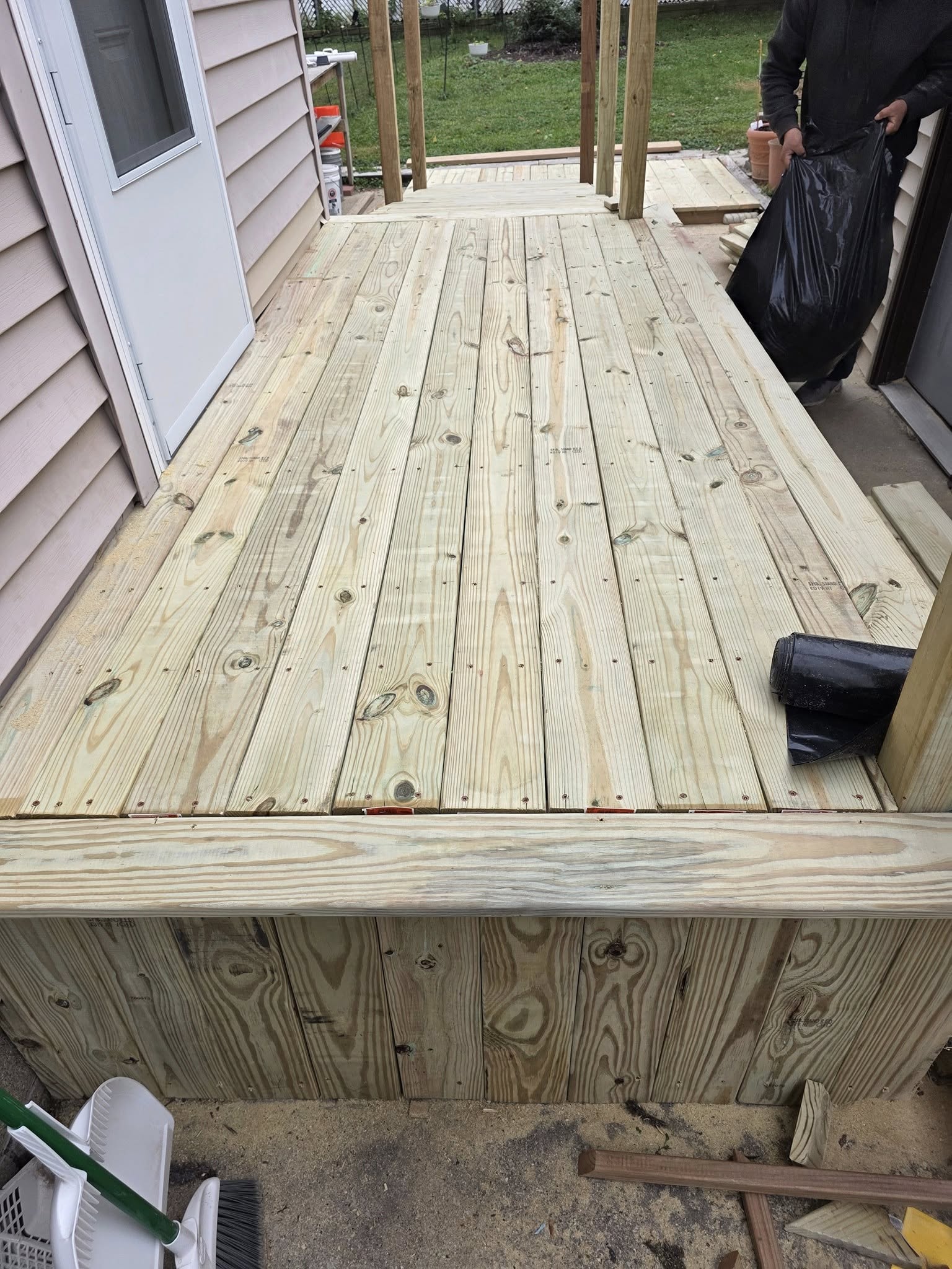A finished cedar deck build by Schwenk’s Contracting